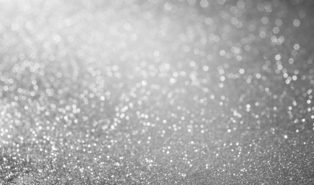 istock Abstract of Bright and sparkling bokeh background. silver and diamond dust bokeh blurred lighting from glitter texture 1161018165
