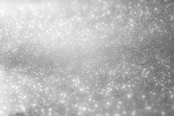 istock Abstract of Bright and sparkling bokeh background. silver and diamond dust bokeh blurred lighting from glitter texture 1161018170
