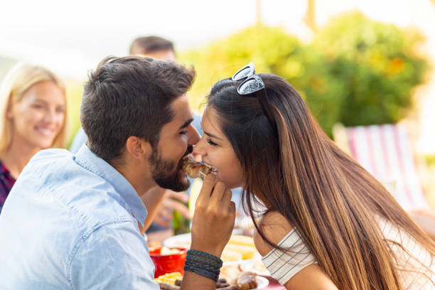 istock Couple sharing a skewer 1161019523