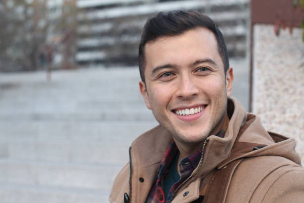 istock Mixed race man with blue eyes smiling 1161019606