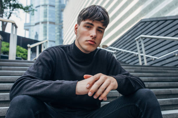 istock Handsome man in black clothing portrait 1161020546