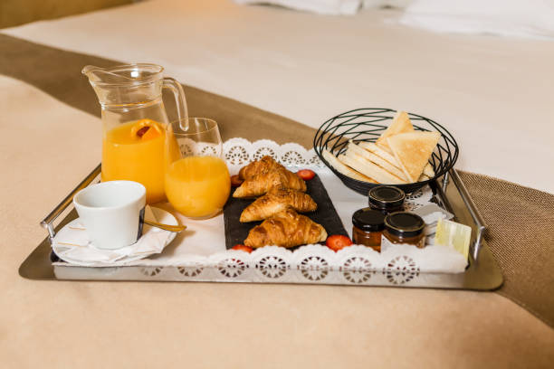 istock Fresh pastry with jams and juice for breakfast 1161020802