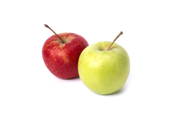 istock Red and green apple on a white background. 1161022262