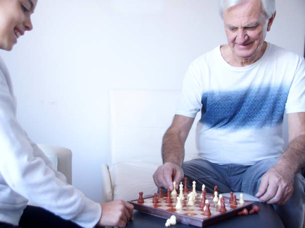 istock grandfather with granddaughter 1161022376