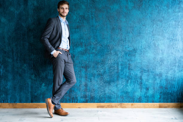 istock Smiling businessman full length portrait 1161041870