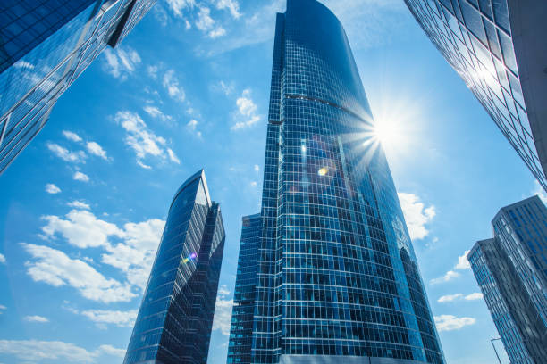 istock Modern skyscrapers under clear blue sky. Business background. 1161041920