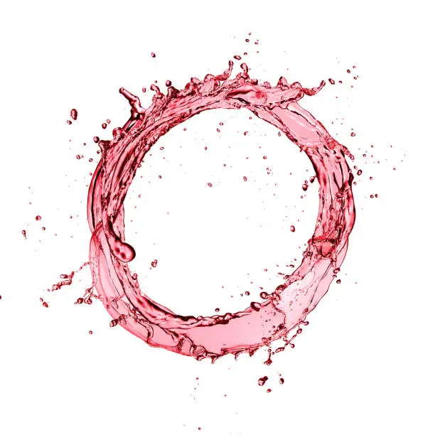 Red wine circle splash isolated on white background. Abstract closeup shape.