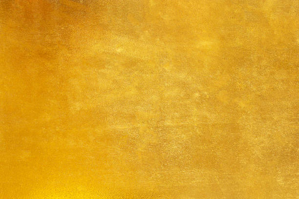 istock Shiny yellow leaf gold foil texture background. 1161049209