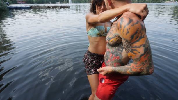istock Couple dancing Bachata in the water 1161051971