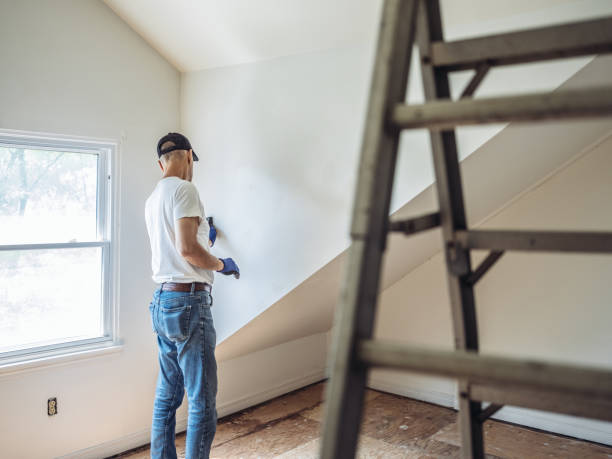 istock Senior man painting apartment interior 1161055380