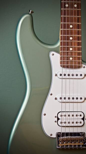 istock Sage green guitar body 1161056618
