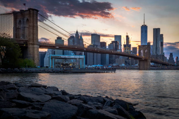istock Brooklyn Bridge with NYC downtown skyline at the backdrop 1161061780
