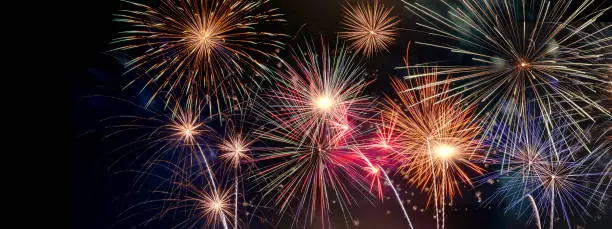 Photo of Celabration festive new year firework headline or bannner.
