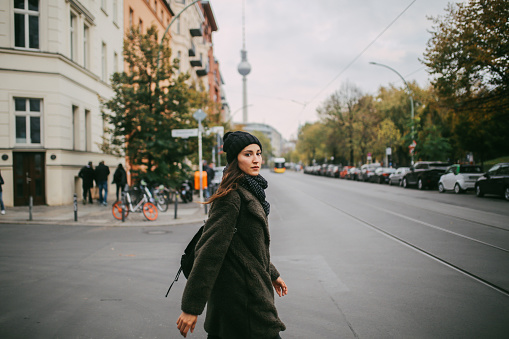 Young woman walking in Berlin Mitte