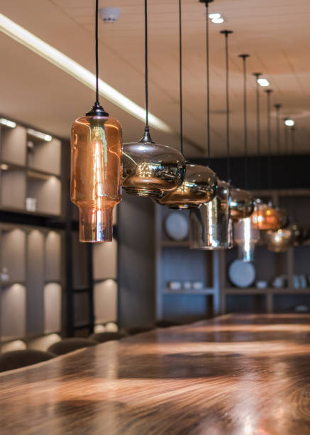 istock Vintage lamp lighting hanging from ceiling (soft focus) for luxurious hotel and restaurant interior decoration 1161071240