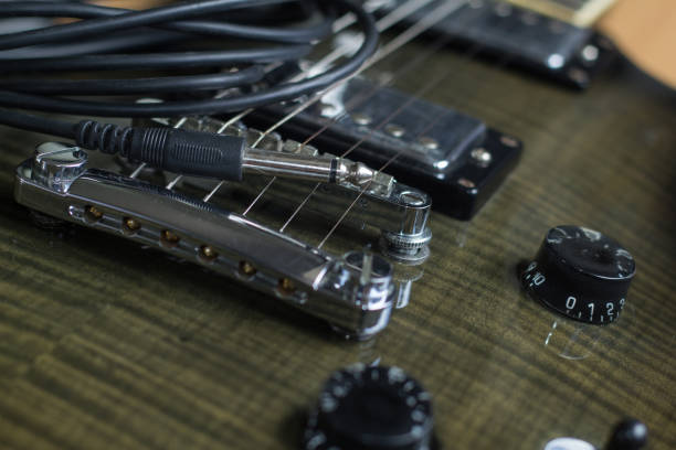 istock electric guitars black color 1161078432