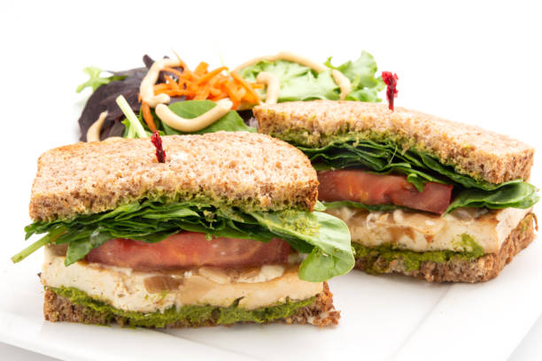 Serving fresh toast sandwiches on a plate in outdoor restaurant