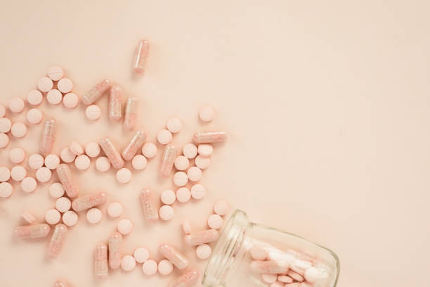 sano in rosa - antibiotic pain cut out bottle foto e immagini stock