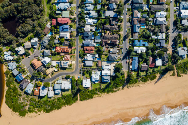 istock Coastal Suburb overhead perspective roof tops 1161083219