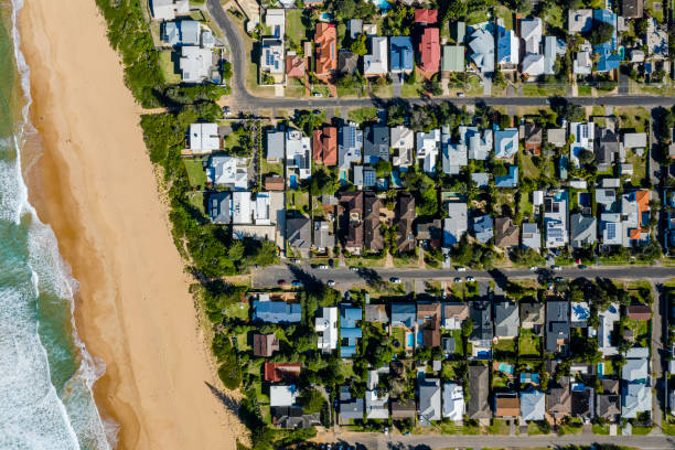 istock Coastal Suburb overhead perspective roof tops 1161083247