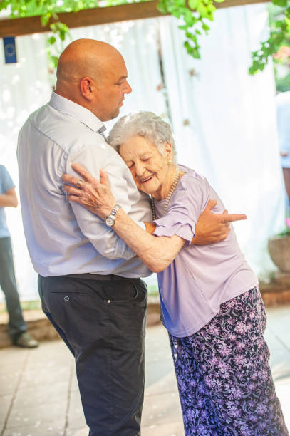 istock Smiling Mother and Son Hugging 1161083977