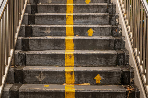 istock Stairs, walkway to pedestrian overpass leading down. 1161085248