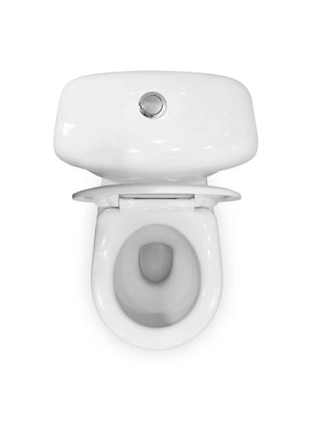 istock White ceramic toilet. Open lid. The view from the top. Close up. Isolated on white background 1161087584