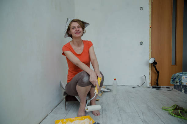istock young woman doing repairs in the apartment 1161091772