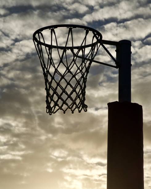 istock Netball Goal in silhouette 1161094136