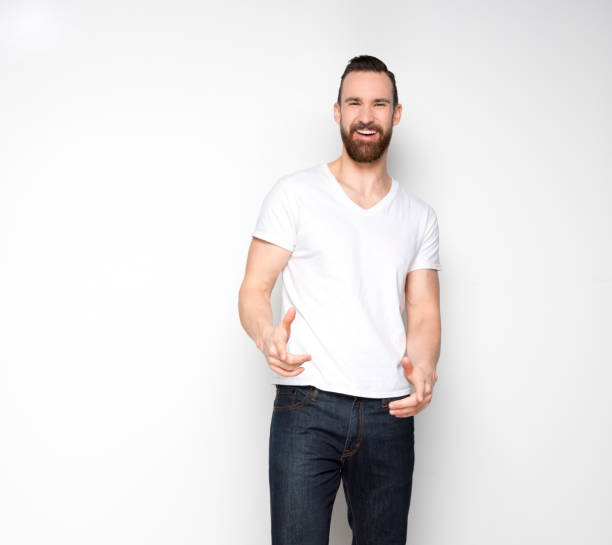 istock Handsome man standing with white shirt on white background 1161109449