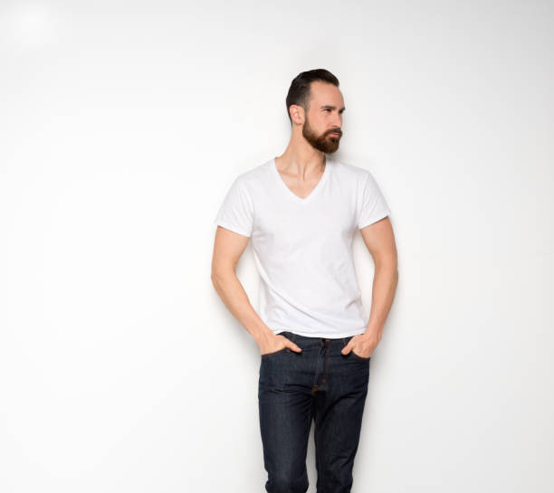 istock Handsome man standing with white shirt on white background 1161109571