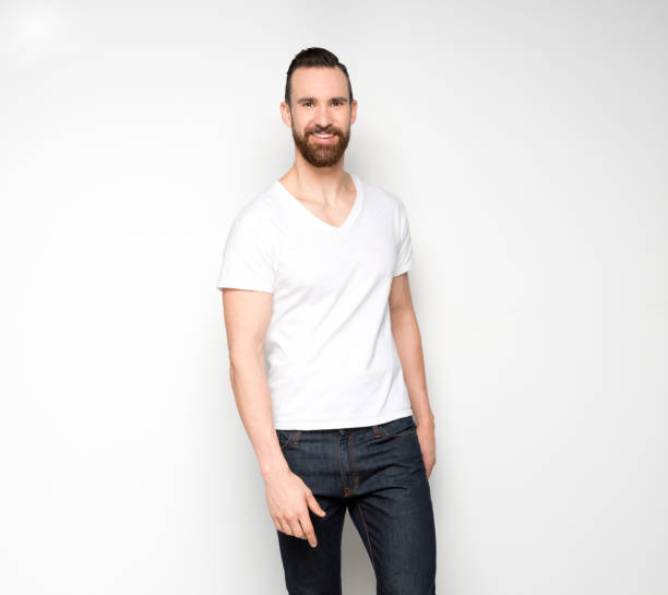 istock Handsome man standing with white shirt on white background 1161110502