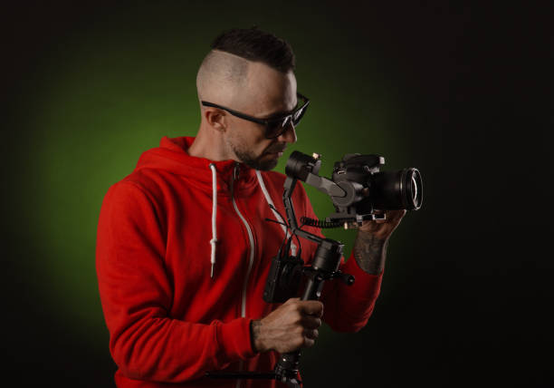 istock the guy with the stabilizer and a dslr camera shoots video 1161110539