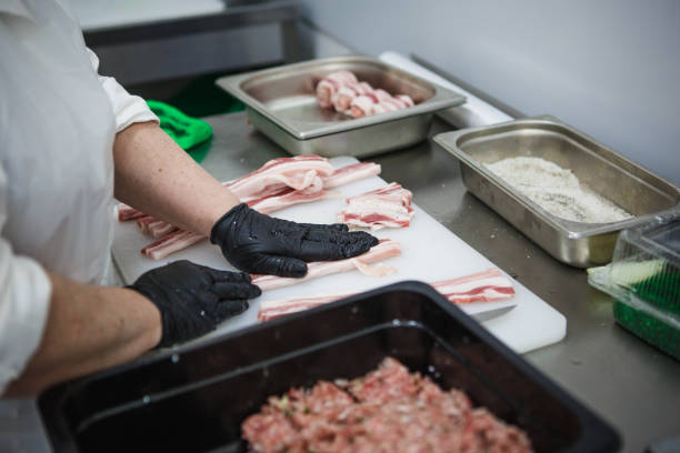 istock The process of preparing meat products. 1161111726