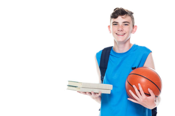 istock 13 year old male basketball player who is also a student 1161118178