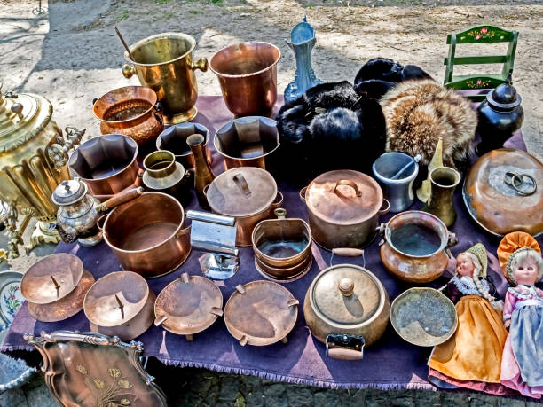 istock different old metal figurines, candlesticks, dishes and other small things on the flea market 1161119619