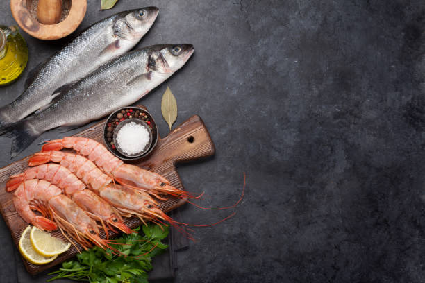 istock Fresh seafood. Trout fish and langostino shrimps 1161120167