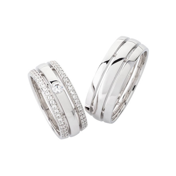 istock Pair of silver wedding rings isolated on white background 1161120391
