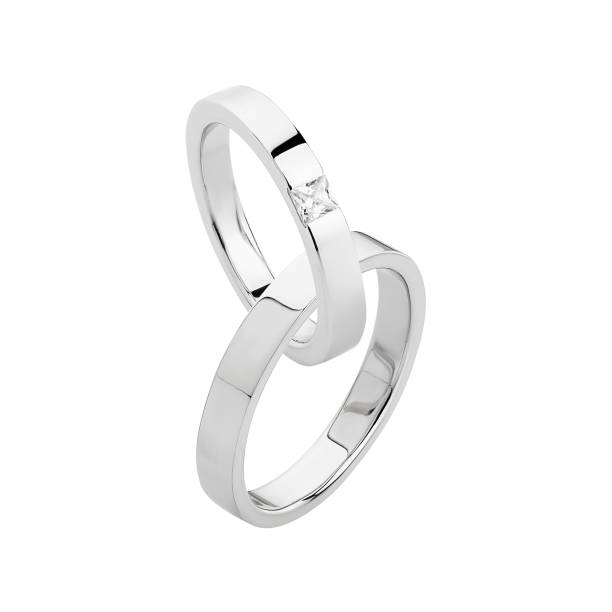 istock Pair of silver wedding rings isolated on white background 1161120436