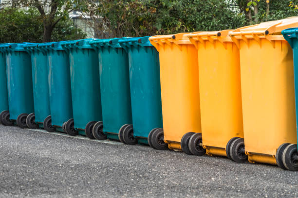 istock Row of green and yellow plastic bin 1161127412