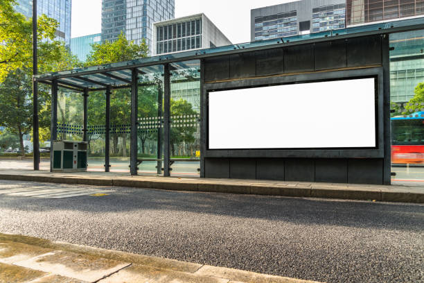 blank advertising billboard at bus stop - billboard symbol city street imagens e fotografias de stock