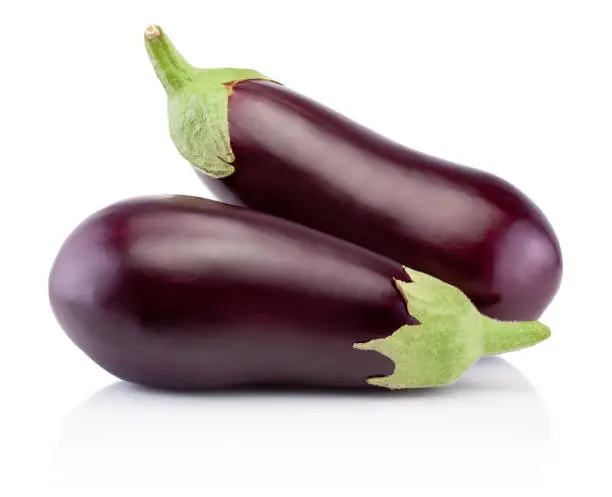 Photo of Two fresh eggplants isolated on a white background