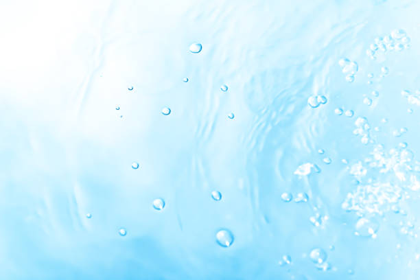 blue waterdrops - water bubble drop splashing imagens e fotografias de stock