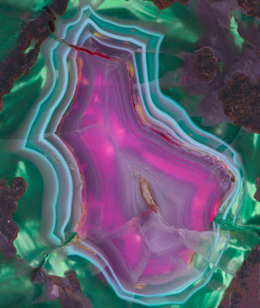 istock Translucent multicolored colorful  slice of natural stone agate. Natural concentric patterns and textures of minerals for background. 1161130242