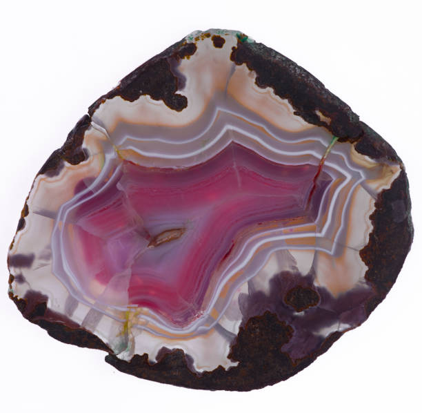 istock Translucent multicolored colorful  slice of natural stone agate. Natural concentric patterns and textures of minerals for background. 1161131136