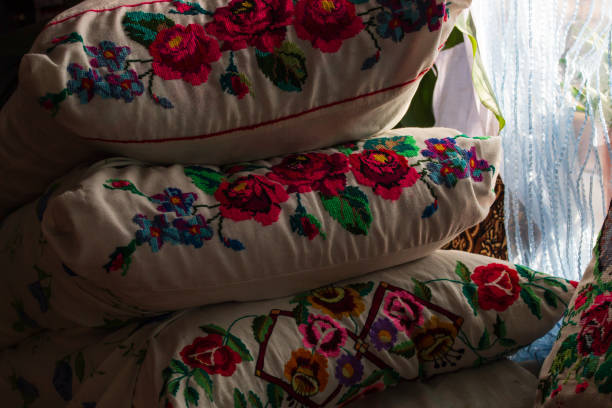 istock An ancient iron bed with embroidered cushions.Old Iron Bed with pillows.Embroidered pillows on an old bed 1161133166