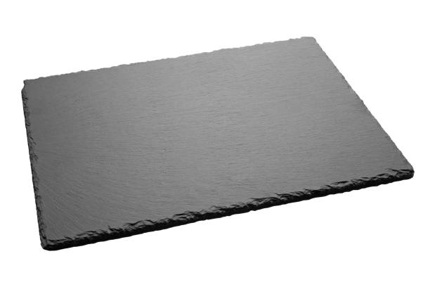 istock Empty food black square slate plate board isolated on white background. Dark grey slate board for dishes. 1161137229