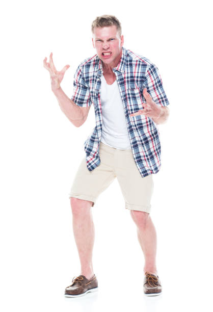 istock Handsome man in shirt and shorts is feeling angry 1161137535