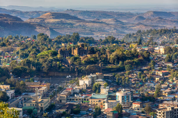 Gondar city with Fasil Ghebbi, Ethiopia Panorama of city Gondar with Fasil Ghebbi, Royal fortress-city within Gondar, Ethiopia. Imperial palace castle complex is also called Camelot of Africa. UNESCO World Heritage Site. ancient ethiopia stock pictures, royalty-free photos & images