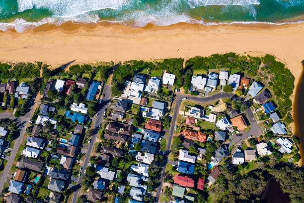 istock Coastal Suburb overhead perspective roof tops 1161138757